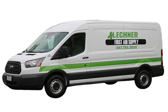 White, green and black Lechner First Aid Supply Truck.